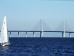 Sailing at Oresund, with the great bridge in the background, Sweden photo